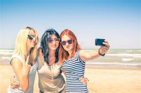 Group Of Girlfriends Taking A Selfie At The Beach Stock Image Image