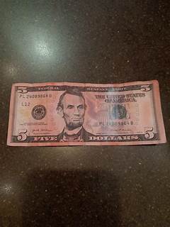 Why Does My Dollar Bill Have A Star On It