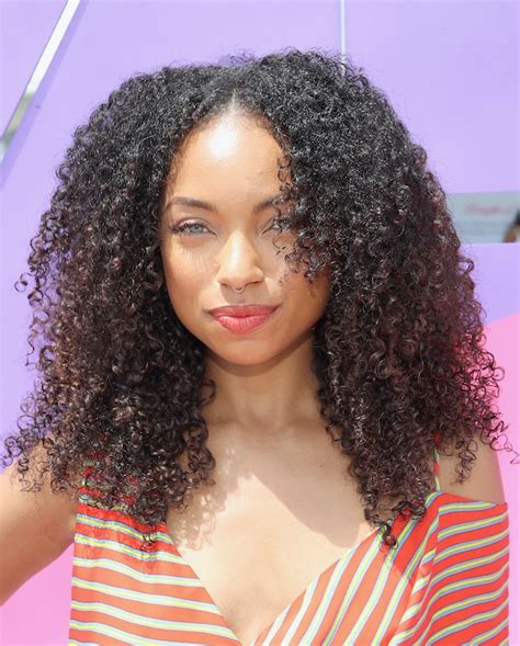 Logan Browning Maintains Her Curly Hair Using This Brand And Seriously
