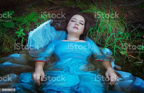 Young Beautiful Drowned Woman Lying In The Water Stock Photo Download