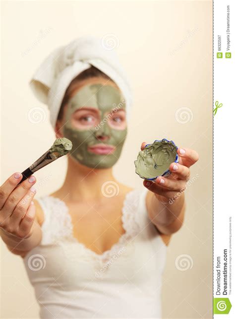 Woman Applying With Brush Clay Mud Mask To Her Face Stock Image Image Of Skincare Wellness