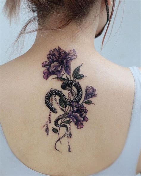 Share 86 Womens Back Tattoos Flowers Ineteachers