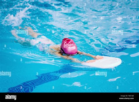 Girl Learning To Swim Stock Photo Alamy