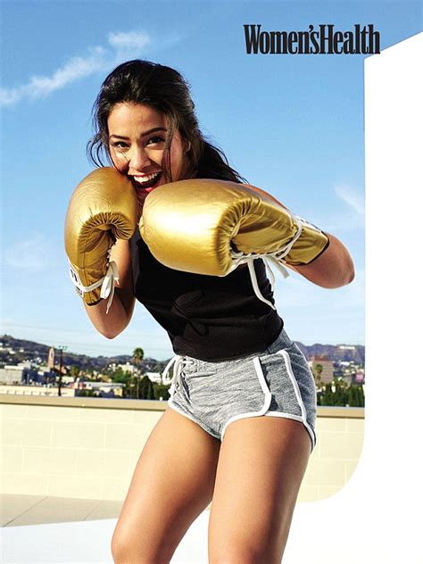 Gina Rodriguez Takes The Plunge In Red Bathing Suit And Strikes Boxing