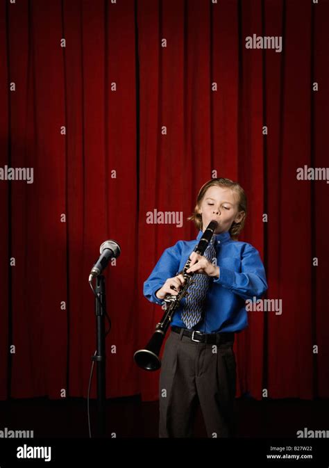 Boy Playing Clarinet On Stage Stock Photo Alamy