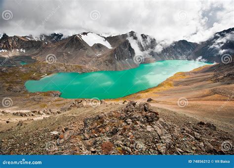 Picturesque Turquoise Mountain Lake Ala Kul Alakol Lake With Cloudy