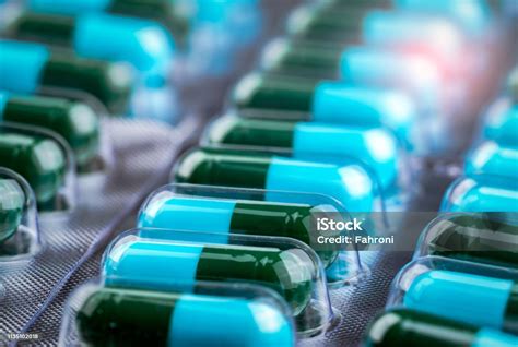 Closeup Greenblue Antibiotic Capsule Pills In Blister Pack