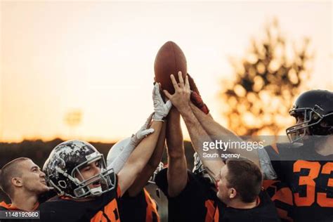 American Football Team Huddle Photos And Premium High Res Pictures