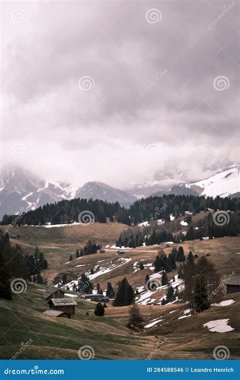 Autumn Meadow In Front Of A Barn In Italian Alps Covered In Fog Stock