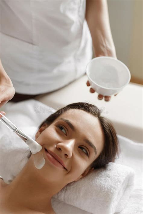 Skin Care Beautiful Woman Getting Cosmetic Mask At Spa Salon Stock