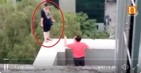 Viral Watch Woman Threatens To Jump Off Five Storied Building After