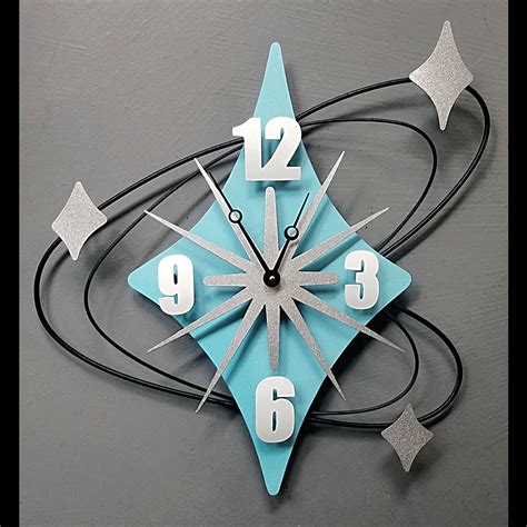 A Clock That Is On The Wall With Numbers And Arrows Around Its Face