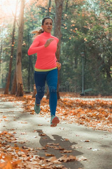 Woman Jogging Outdoors In Park Stock Image Image Of Runner Active