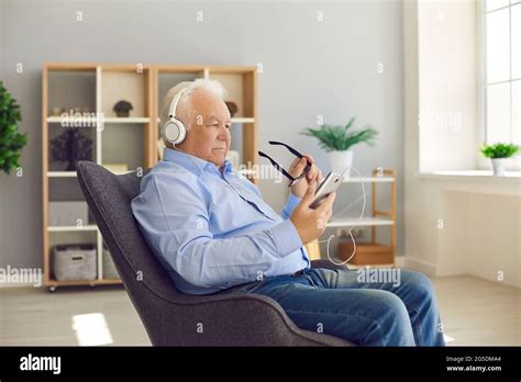 Happy Old Man In Armchair High Resolution Stock Photography And Images