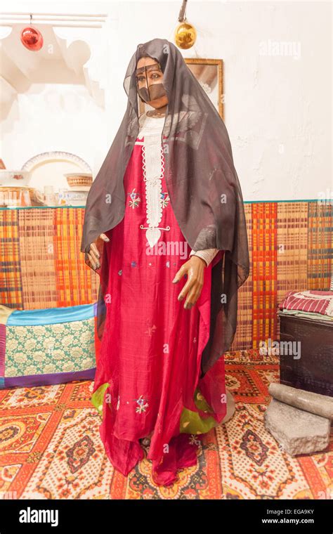 Bedouin Woman In Traditional Dress In The Museum Of Ajman Stock Photo
