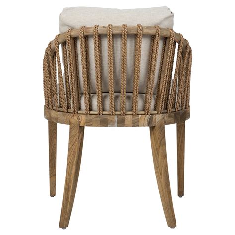 The distinctive design features a cane seat and backrest. Taelyn Rustic Lodge Sand Cushion Teak Dining Room Armchair ...