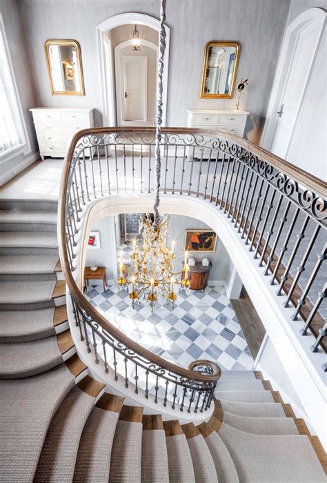 The Bold Staircase Of Our French Eclectic Project Features A Wrought