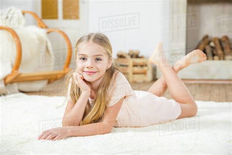 A Cute Young Girl Lying On A Bench Reading A Book Hoodoo Wallpaper