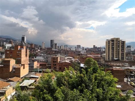 Medellin Downtown Colombia With High Buildings And A Partly Cloudy