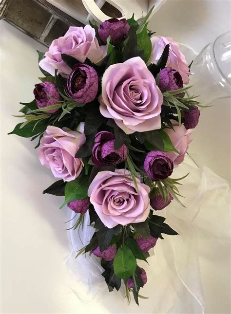How do you find out what kind (and colors) of flowers are in season during your types of wedding bouquets. Details about SILK WEDDING BOUQUET LILAC LAVENDER ROSES ...