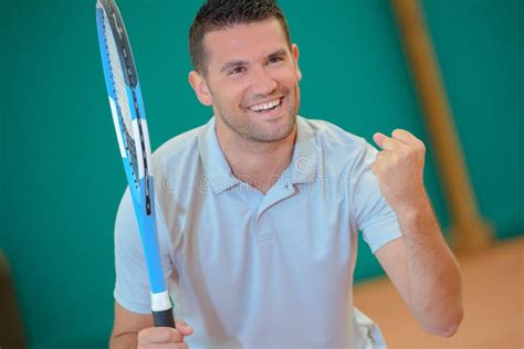 Man Making Victory Gesture On Tennis Court Stock Photo Image Of Smile