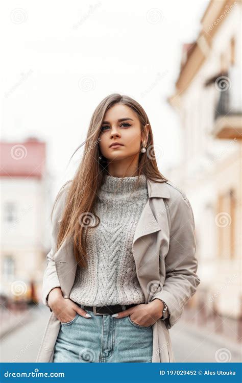 Pretty Young Fashionable Woman In Stylish Autumn Spring Clothes Walks