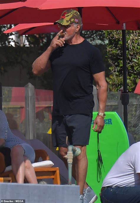Sylvester stallone shares a funny video from his upcoming movie samaritan, where his wife, jennifer flavin, unknowingly interrupts a scene. Sylvester Stallone hits the beach with wife Jennifer ...