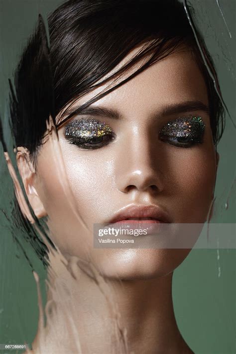 Beautiful Woman Behind Wet Glass Photo Getty Images