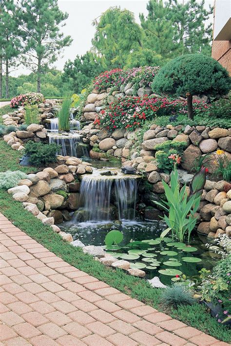 add curb appeal to your yard with a cascading waterfall and aquatic plants backyard water