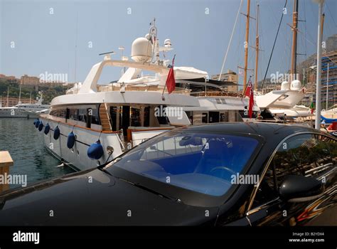 Luxury Car And Yacht In Monte Carlo Monaco Stock Photo Alamy