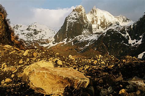 Boulder Rocks And Snow Capped Mountain Reine Lofoten Norway Digital