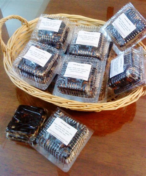 Batik is made either by drawing dots and lines of the resist with a spouted tool called a canting, or by printing the resist with a copper stamp called a cap. shaeryscake: Kek Batik Jawa