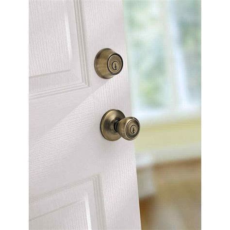 Kwikset Tylo Antique Brass Exterior Entry Door Knob And Double Cylinder