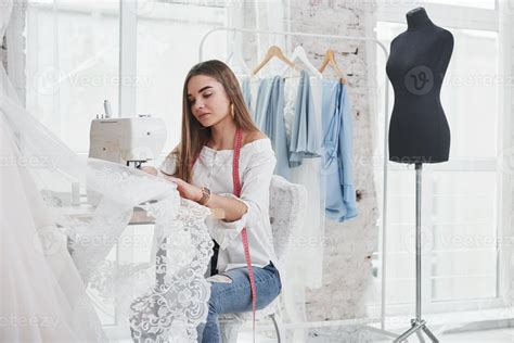The Process Of Sewing The Dress Female Fashion Designer Works On The New Clothes In The