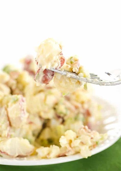 Tender potatoes, crunchy celery, mustard, eggs, and a creamy dressing make this side dish a family favorite. Best Ever Potato Salad Recipe | Brown Eyed Baker