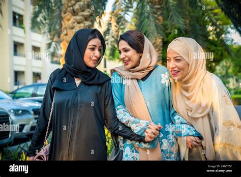 Arabic Women With Abaya Bonding And Having Fun Outdoors Happy Middleastern Friends Meeting And