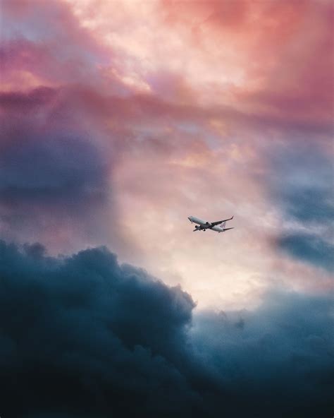 Download Distant Small Airplane Flying High Wallpaper