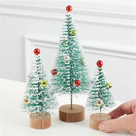 set of frosted decorated bottle brush trees bottle brush trees christmas and winter
