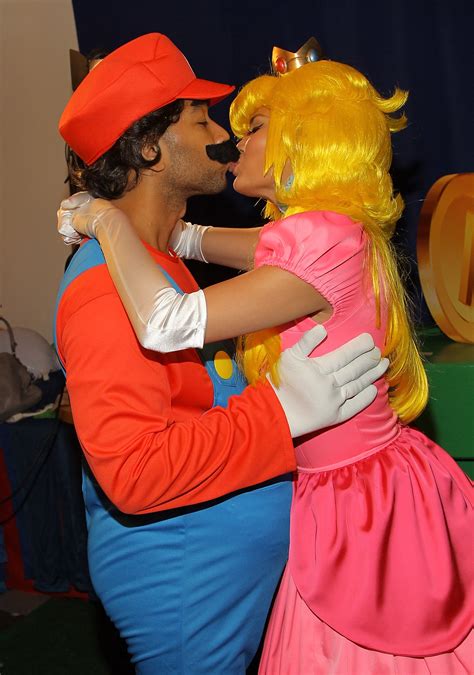The Couple Looked Too Cute In Their Mario And Princess Peach Costumes Chrissy Teigen And John