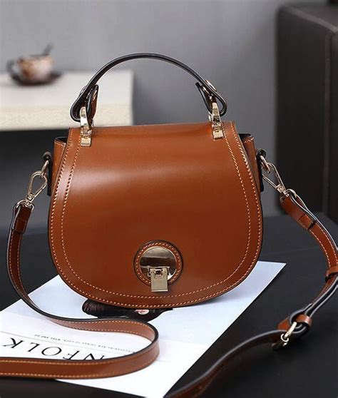 Modern Style Oval Shape Lock Crossbody Bag Bags Leather Handbags