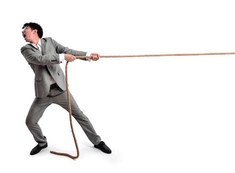 Free Photo Business Man Pulling On A Rope