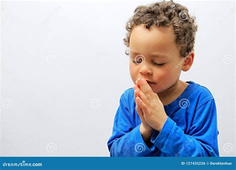 Little Boy Praying To God Stock Photo Image Of Cross 127435226