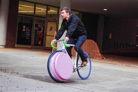 Reinventing The Hubless Wheel Transport Is A Trunk For Your Bike