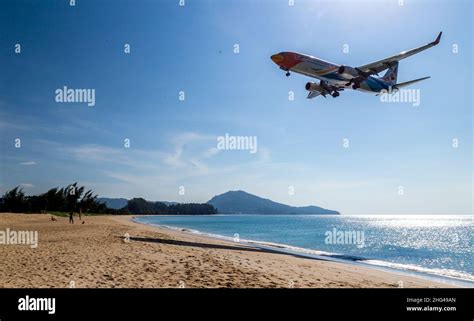 Mai Khao Beach Airplane Spotting Phuket Airport In Thailand Stock