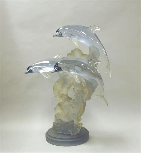 At Auction Donjo Acrylic Three Dolphins Sculpture