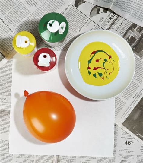 Dip An Inflated Balloon Into A Bowl Of Tempera Paint To Create Vibrant