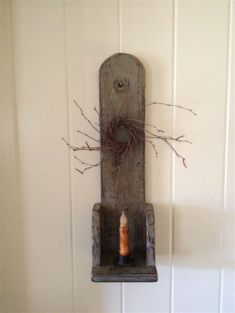 Frame it by placing sconce lights on either side. 17 Best images about Primitive candle holders on Pinterest ...