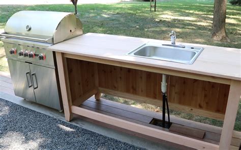 Build An Outdoor Kitchen Cabinet And Countertop With Sink Jon Peters