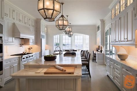 If you rent or don't want to build extra kitchen cabinets, this is the solution for you. Long Kitchen Island - Transitional - kitchen - Shope Reno Wharton