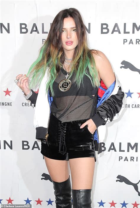 Bella Thorne Exposes Her Tiny Bra And Abs In A Sheer Mesh Top As She